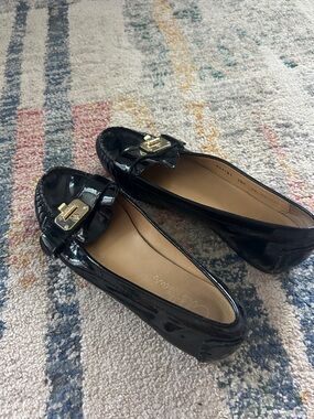 Cole Haan Black Patent Loafers with Gold Accent